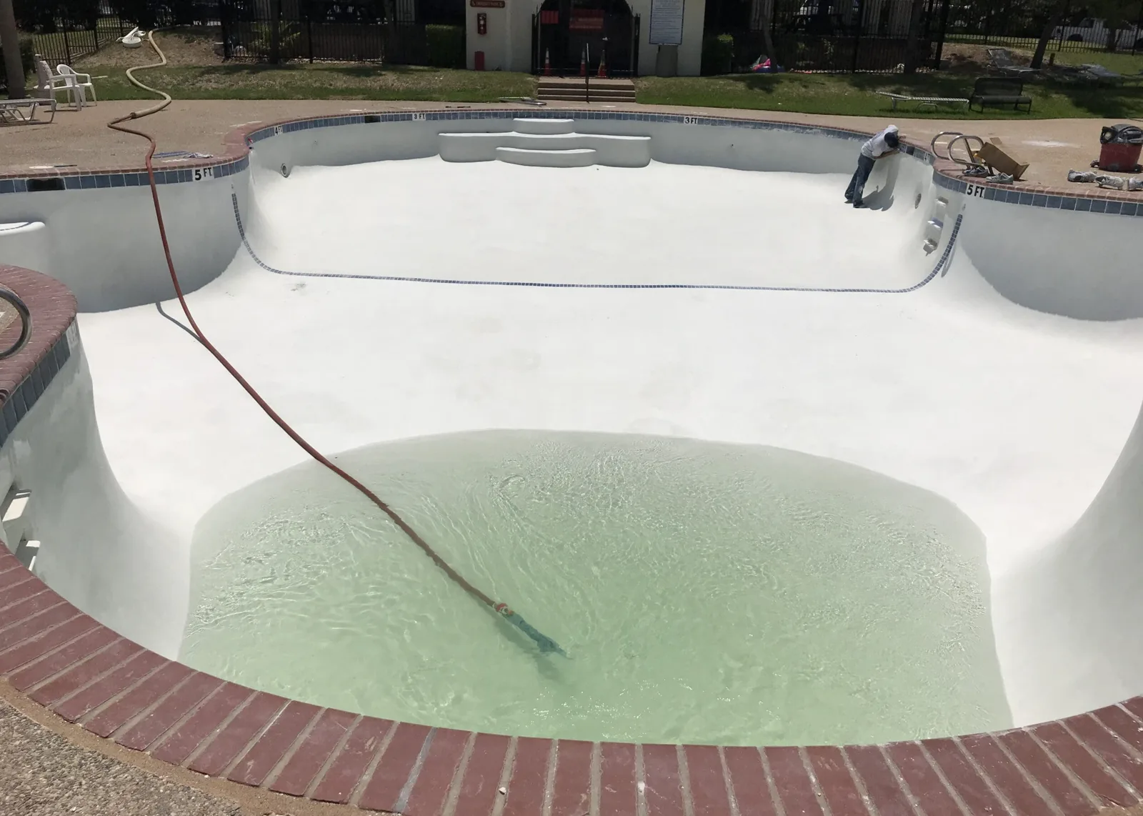 Community pool deck and water before and after remodeling