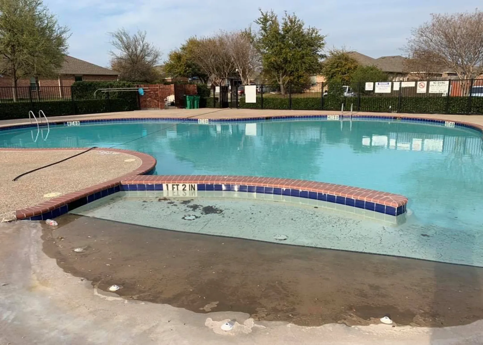 Neighborhood pool with worn waterline before and renewed finish after renovation