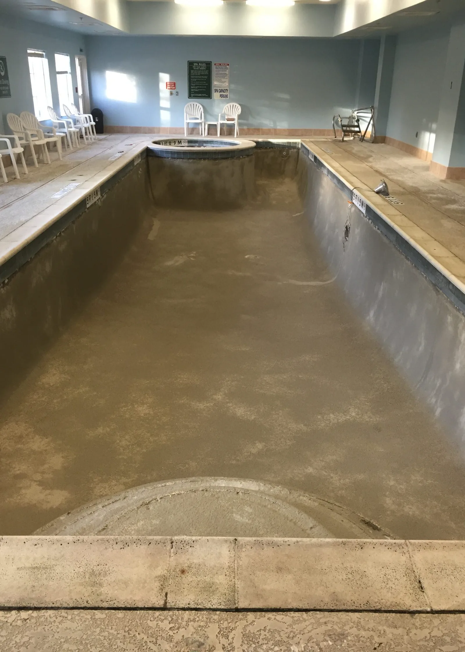 Amenity pool before and after resurfacing and tile work